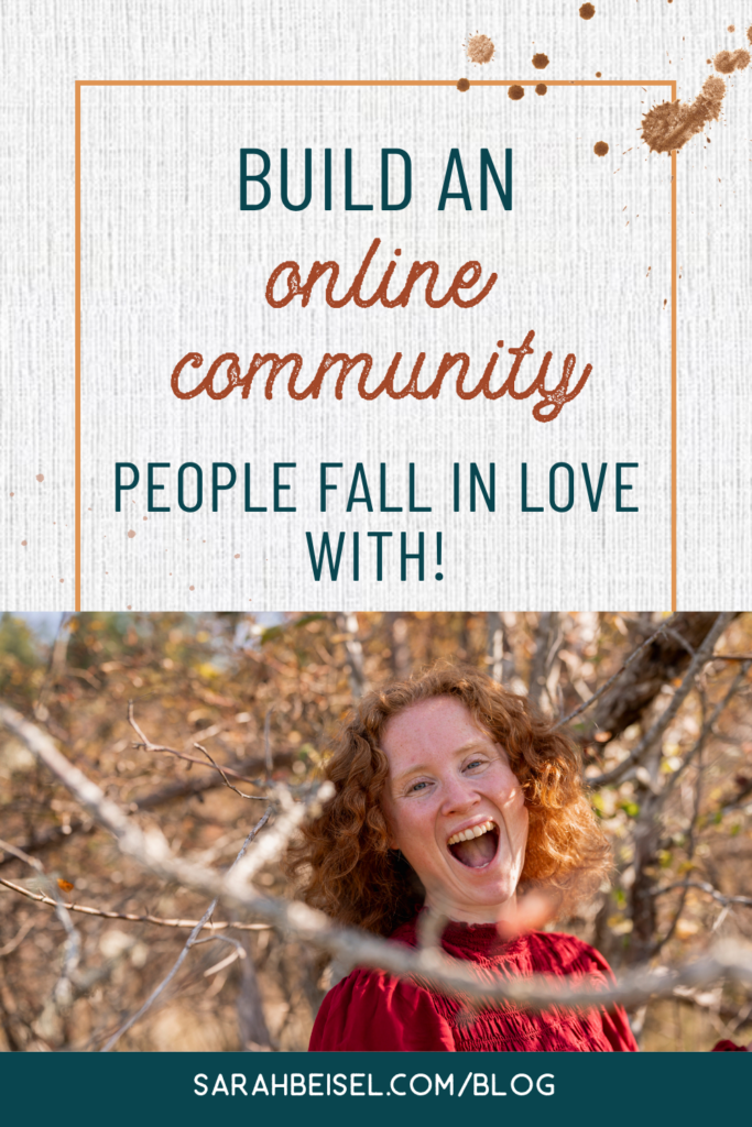 Red haired woman laughing in front of trees