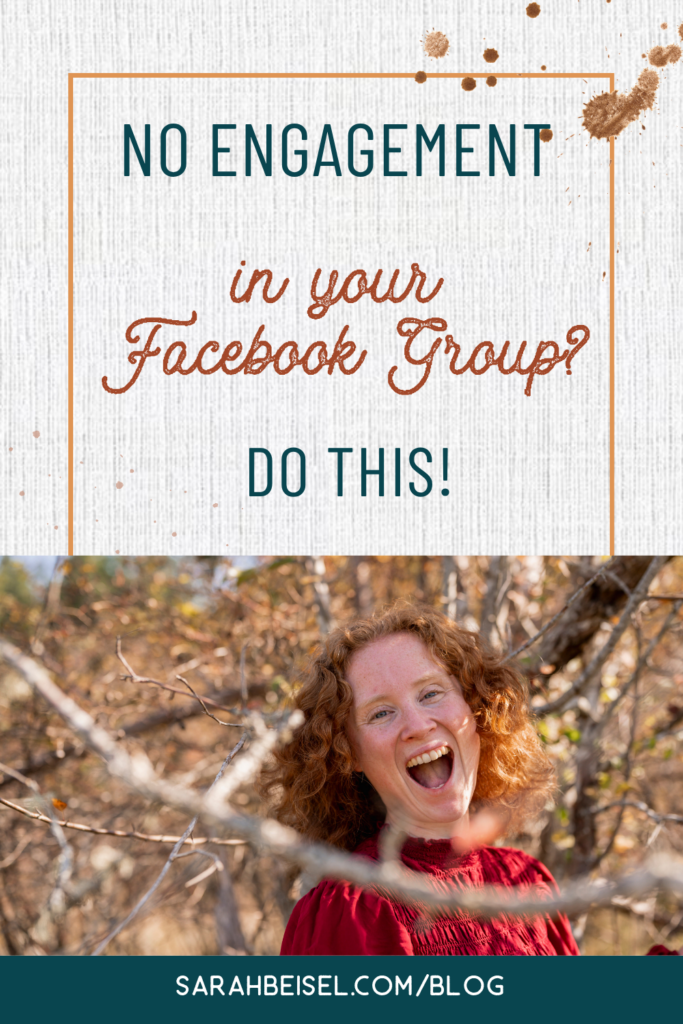 red haired woman in front of trees 