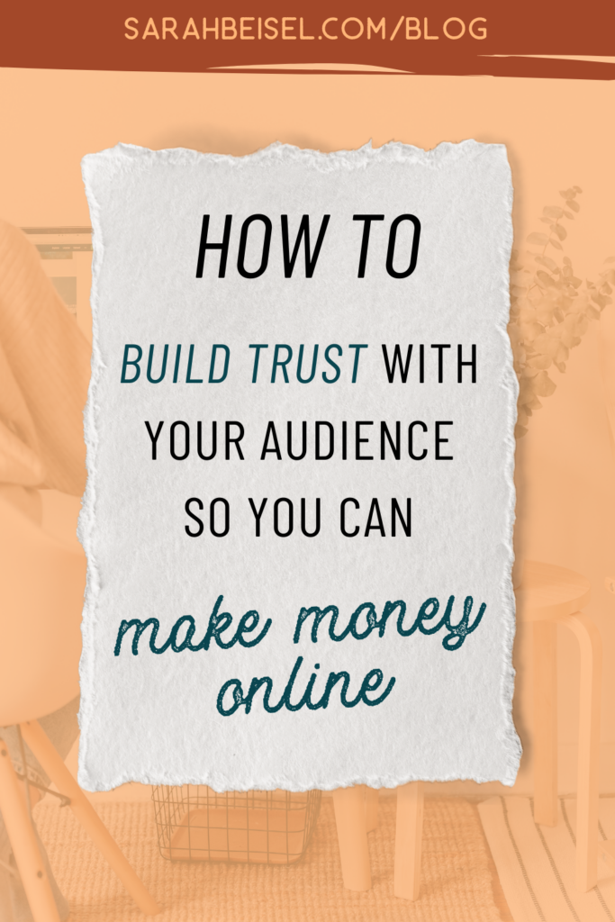 light orange background with a piece of paper in the center and text inside reading how to build trust with your audience so you can make money online.