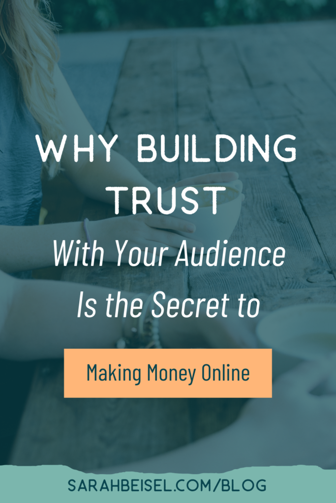 photo in the background of two women sitting at a wooden table with cups of coffee and text in front of the photo reading why building trust with your audience is the secret to making money online.