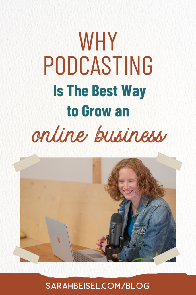 photo of a curly red haired woman in a denim jacket sitting in a coffee shop with her laptop and microphone. Text above the photo reading Why podcasting is the best way to grow an online business.
